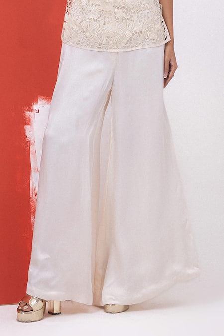 Buy_Mehak Sharma_White Satin Cut Work, Pearls Round Cutdana Embroidered Top And Flared Pant Set _Online_at_Aza_Fashions