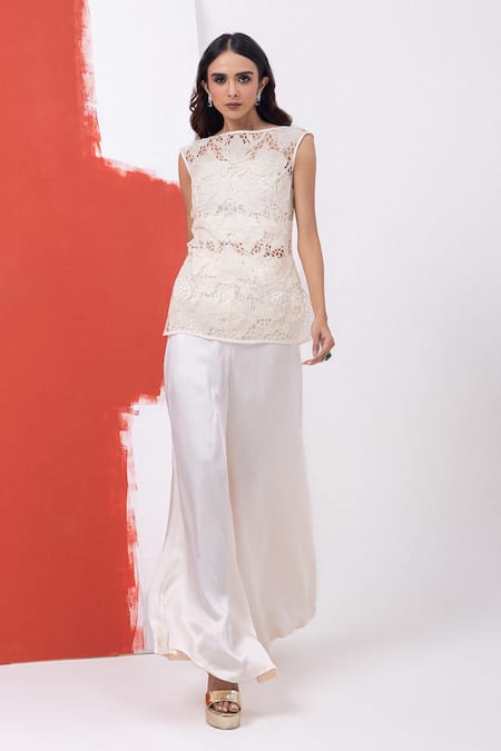 Mehak Sharma_White Satin Cut Work, Pearls Round Cutdana Embroidered Top And Flared Pant Set _at_Aza_Fashions