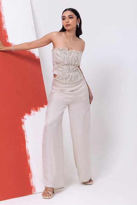 Mehak Sharma_White Satin Cut Work, Pearls, Sequins Cutdana Embroidered Off Bustier Set _at_Aza_Fashions