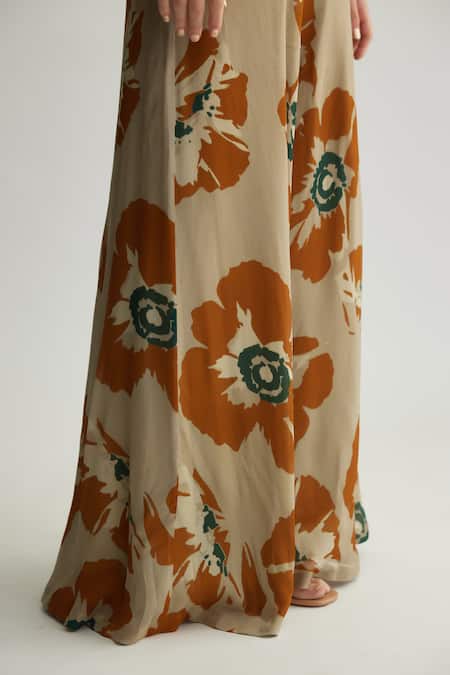 KoAi_Beige Chiffon Print Floral Flared Pant _Online_at_Aza_Fashions