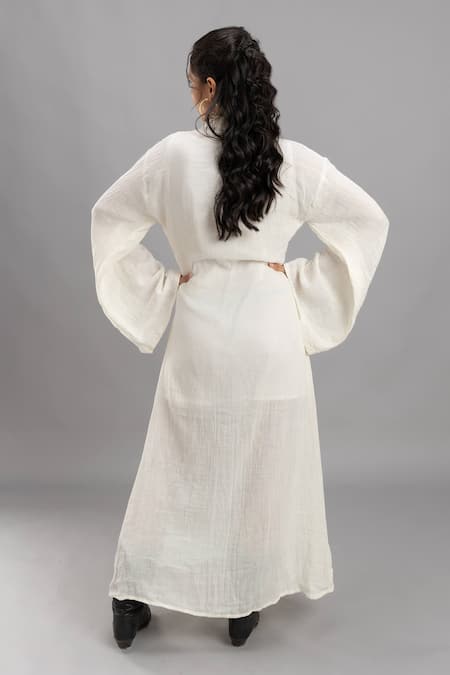Shop Lavina Sippy White Cotton Collared Bell Sleeve Wrap Around Dress at Aza Fashions Shop_Lavina Sippy_White Cotton Collared Bell Sleeve Wrap Around Dress _at_Aza_Fashions