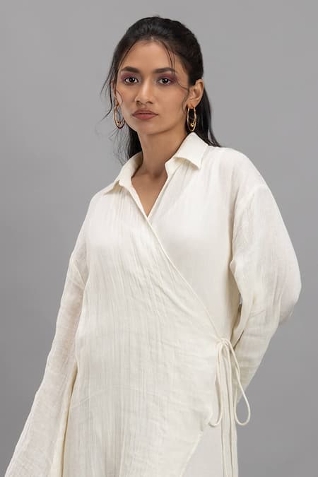 Lavina Sippy White Cotton Collared Bell Sleeve Wrap Around Dress Online at Aza Fashions Lavina Sippy_White Cotton Collared Bell Sleeve Wrap Around Dress _Online_at_Aza_Fashions