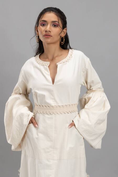 Lavina Sippy White Cotton Split V-neck Maxi Dress With Braided Belt at Aza Fashions Lavina Sippy_White Cotton Split V-neck Maxi Dress With Braided Belt _at_Aza_Fashions