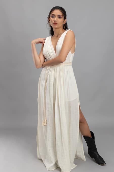 Shop Lavina Sippy White Cotton Plunge Neck Pleated Maxi Dress With Belt at Aza Fashions Shop_Lavina Sippy_White Cotton Plunge Neck Pleated Maxi Dress With Belt _at_Aza_Fashions