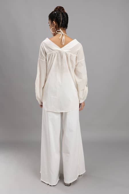 Shop Lavina Sippy White Cotton V-neck Organic Sheer Tunic at Aza Fashions Shop_Lavina Sippy_White Cotton V-neck Organic Sheer Tunic _at_Aza_Fashions