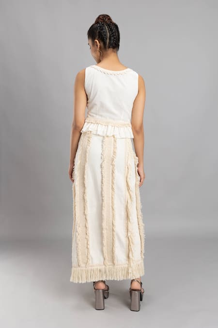Shop Lavina Sippy White Cotton Tassels, Lace Fringed Thigh Slit Skirt at Aza Fashions Shop_Lavina Sippy_White Cotton Tassels, Lace Fringed Thigh Slit Skirt _at_Aza_Fashions