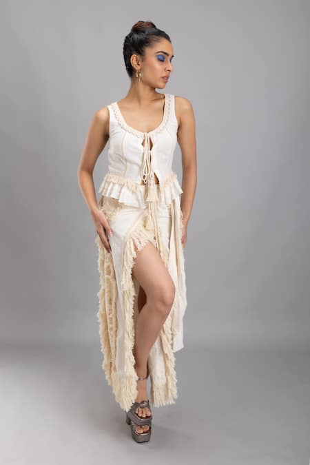 Buy Lavina Sippy White Cotton Tassels, Lace Fringed Thigh Slit Skirt Online at Aza Fashions Buy_Lavina Sippy_White Cotton Tassels, Lace Fringed Thigh Slit Skirt _Online_at_Aza_Fashions