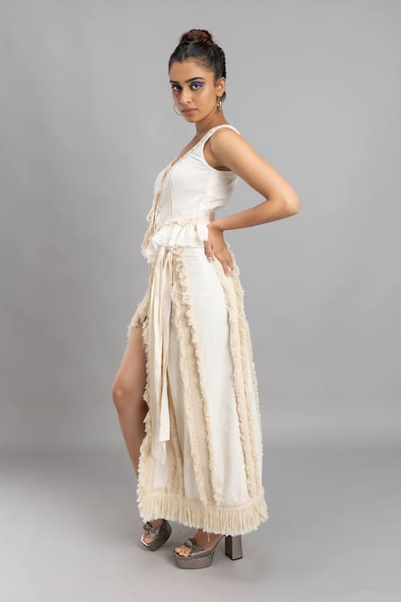 Lavina Sippy White Cotton Tassels, Lace Fringed Thigh Slit Skirt at Aza Fashions Lavina Sippy_White Cotton Tassels, Lace Fringed Thigh Slit Skirt _at_Aza_Fashions
