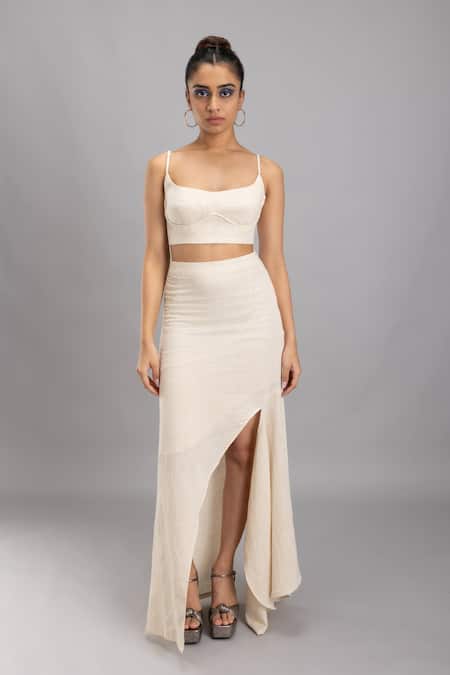 Shop Lavina Sippy Beige Handloom Cotton A-line Solid Skirt With Slit at Aza Fashions Shop_Lavina Sippy_Beige Handloom Cotton A-line Solid Skirt With Slit _at_Aza_Fashions