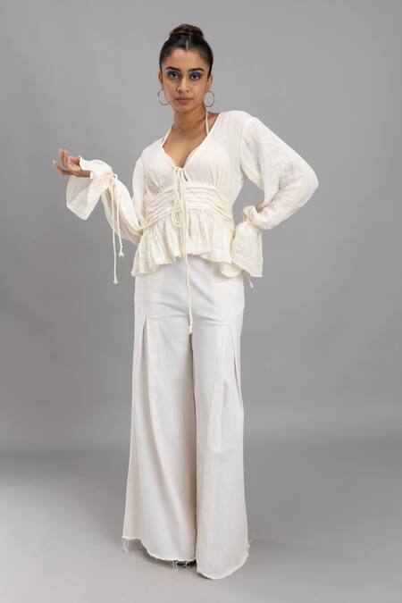 Lavina Sippy White Cotton V-neck Balloon Sleeve Peplum Top Online at Aza Fashions Lavina Sippy_White Cotton V-neck Balloon Sleeve Peplum Top _Online_at_Aza_Fashions