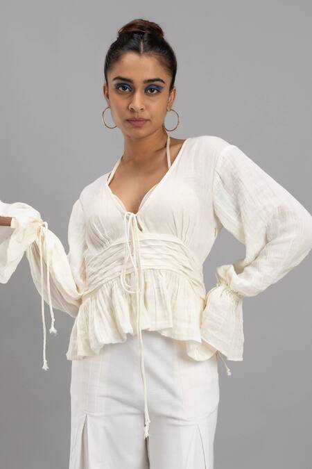 Buy Lavina Sippy White Cotton V-neck Balloon Sleeve Peplum Top Online at Aza Fashions Buy_Lavina Sippy_White Cotton V-neck Balloon Sleeve Peplum Top _Online_at_Aza_Fashions