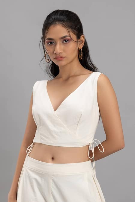 Buy Lavina Sippy White Cotton V-neck Solid Wrap Crop Top Online at Aza Fashions Buy_Lavina Sippy_White Cotton V-neck Solid Wrap Crop Top _Online_at_Aza_Fashions