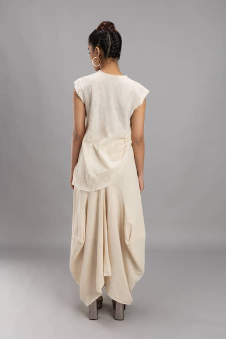 Shop Lavina Sippy Beige Handloom Cotton V-neck Solid Cap Sleeve Vest Top at Aza Fashions Shop_Lavina Sippy_Beige Handloom Cotton V-neck Solid Cap Sleeve Vest Top _at_Aza_Fashions