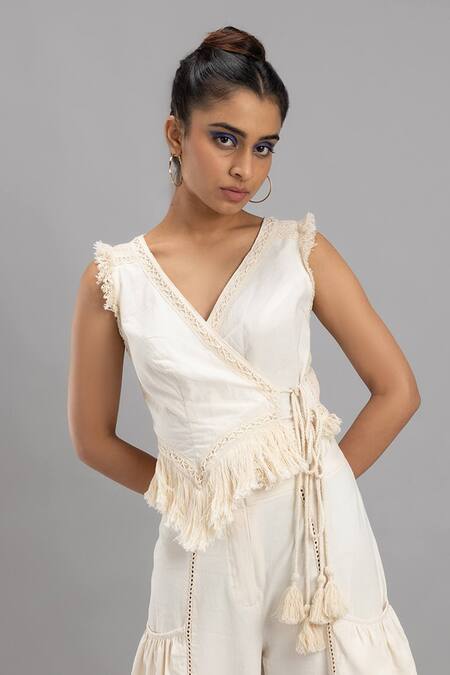 Lavina Sippy White Cotton Tassels V-neck Embellished Waistcoat Top Online at Aza Fashions Lavina Sippy_White Cotton Tassels V-neck Embellished Waistcoat Top _Online_at_Aza_Fashions