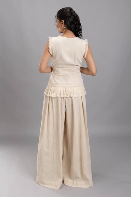 Shop Lavina Sippy Beige Handloom Cotton Lace, Tassels V-neck Embellished Waistcoat Top at Aza Fashions Shop_Lavina Sippy_Beige Handloom Cotton Lace, Tassels V-neck Embellished Waistcoat Top _at_Aza_Fashions