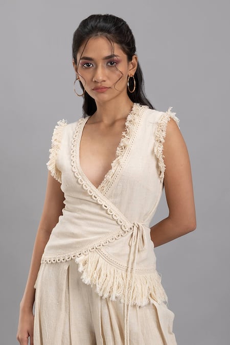 Lavina Sippy Beige Handloom Cotton Lace, Tassels V-neck Embellished Waistcoat Top Online at Aza Fashions Lavina Sippy_Beige Handloom Cotton Lace, Tassels V-neck Embellished Waistcoat Top _Online_at_Aza_Fashions