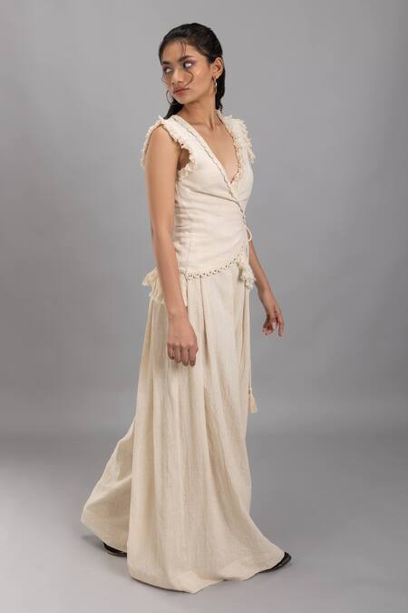 Buy Lavina Sippy Beige Handloom Cotton Lace, Tassels V-neck Embellished Waistcoat Top Online at Aza Fashions Buy_Lavina Sippy_Beige Handloom Cotton Lace, Tassels V-neck Embellished Waistcoat Top _Online_at_Aza_Fashions
