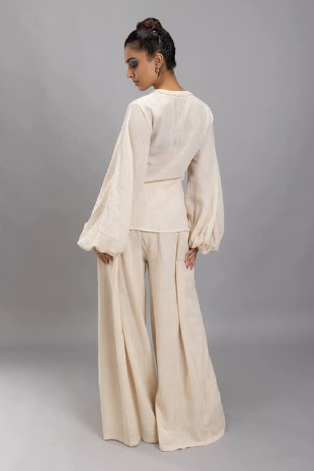 Shop Lavina Sippy Beige Handloom Cotton Lace V-neck Embellished Wrap Top at Aza Fashions Shop_Lavina Sippy_Beige Handloom Cotton Lace V-neck Embellished Wrap Top _at_Aza_Fashions