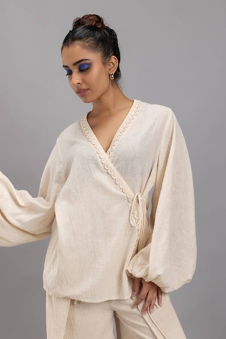 Lavina Sippy Beige Handloom Cotton Lace V-neck Embellished Wrap Top Online at Aza Fashions Lavina Sippy_Beige Handloom Cotton Lace V-neck Embellished Wrap Top _Online_at_Aza_Fashions