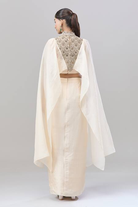 Shop Anand Kabra Beige Silk Zari, Embroidery Round Neck Scallop Cutwork Cape Top And Skirt Set at Aza Fashions Shop_Anand Kabra_Beige Silk Zari, Embroidery Round Neck Scallop Cutwork Cape Top And Skirt Set_at_Aza_Fashions