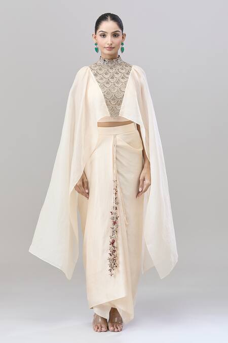 Shop Anand Kabra Beige Silk Zari, Embroidery Round Neck Scallop Cutwork Cape Top And Skirt Set Online at Aza Fashions Shop_Anand Kabra_Beige Silk Zari, Embroidery Round Neck Scallop Cutwork Cape Top And Skirt Set_Online_at_Aza_Fashions