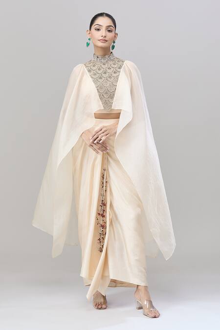 Anand Kabra Beige Silk Zari, Embroidery Round Neck Scallop Cutwork Cape Top And Skirt Set at Aza Fashions Anand Kabra_Beige Silk Zari, Embroidery Round Neck Scallop Cutwork Cape Top And Skirt Set_at_Aza_Fashions