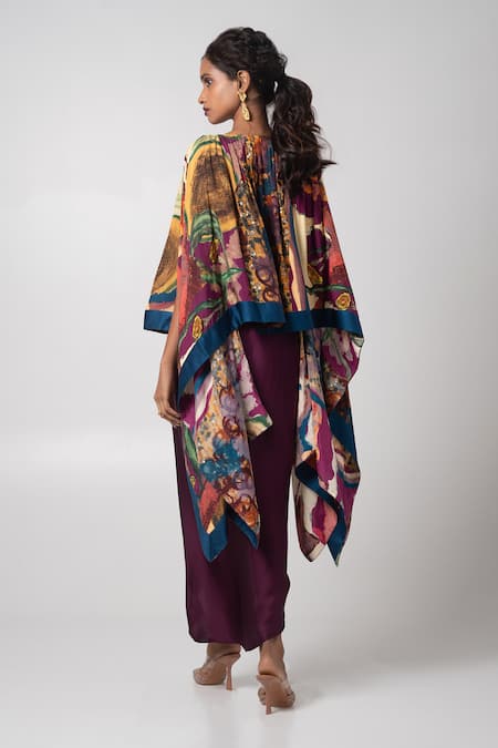 Shop Advait Purple Habutai Abstract Round Poncho And Wrap Skirt Set at Aza Fashions Shop_Advait_Purple Habutai Abstract Round Poncho And Wrap Skirt Set _at_Aza_Fashions