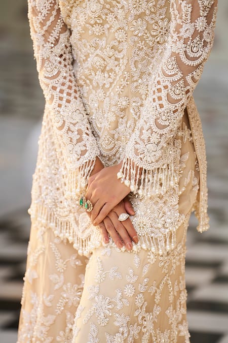 Buy_Seema Gujral_Beige Net Pearls, Sequins, Embroidery V-neck Cutwork Kurta Sharara Set _Online_at_Aza_Fashions