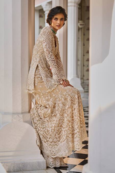 Shop_Seema Gujral_Beige Net Pearls, Sequins, Embroidery V-neck Cutwork Kurta Sharara Set _Online_at_Aza_Fashions