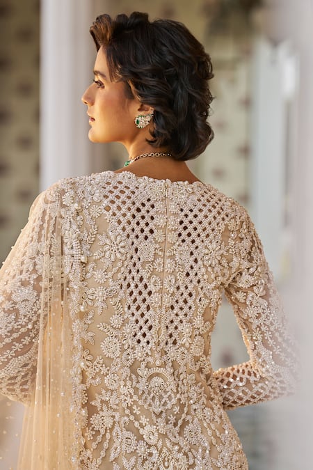 Seema Gujral_Beige Net Pearls, Sequins, Embroidery V-neck Cutwork Kurta Sharara Set _at_Aza_Fashions