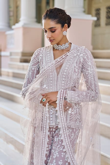 Seema Gujral_Mauve Net Pearls, Sequins, Tassels V-neck Embroidered Jacket Kurta Sharara Set _Online_at_Aza_Fashions