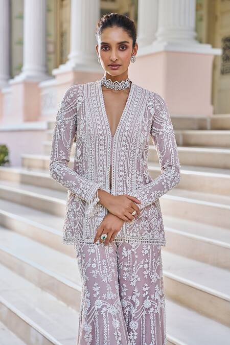 Seema Gujral_Mauve Net Pearls, Sequins, Tassels V-neck Embroidered Jacket Kurta Sharara Set _at_Aza_Fashions