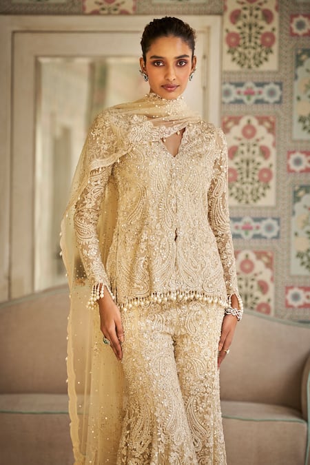 Buy Seema Gujral Beige Silk, Tissue Pearls, Sequins, Tassels Paisley Thread Embroidered Kurta Set Online at Aza Fashions Buy_Seema Gujral_Beige Silk, Tissue Pearls, Sequins, Tassels Paisley Thread Embroidered Kurta Set _Online_at_Aza_Fashions
