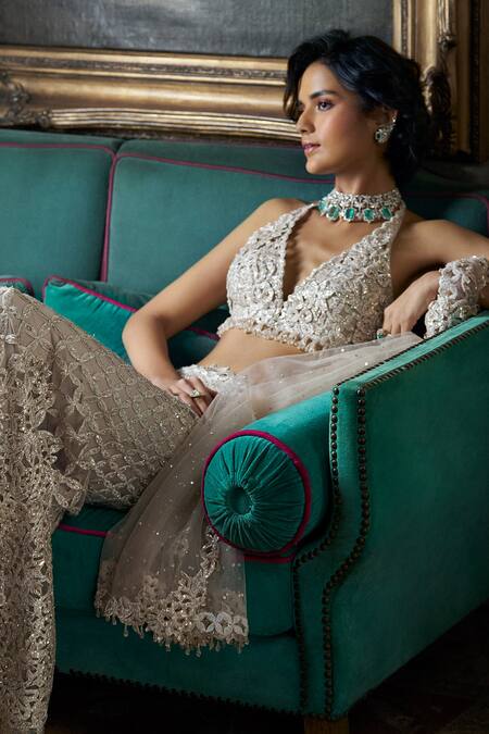 Seema Gujral_Cream Net Tassels, Crystals Halter Neck Floral Cutwork Blouse And Pant Set _at_Aza_Fashions