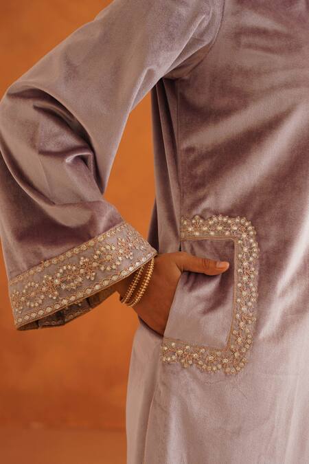 Inej_Purple Velvet Embroidery, Tassels Round Neck Floral Kurta Set _at_Aza_Fashions