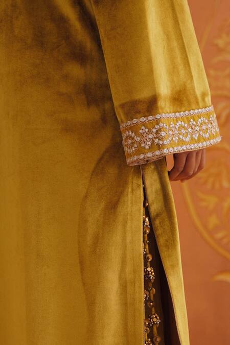 Inej_Yellow Velvet Embroidery, Tassels Round Neck Floral Kurta Set _at_Aza_Fashions