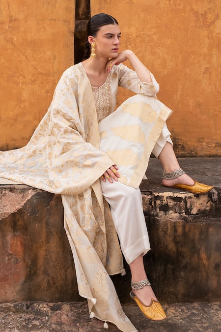 Shop_Karaj Jaipur_Cream Chanderi Embroidery, Tassels Round Neck Aari Kurta Set _Online_at_Aza_Fashions