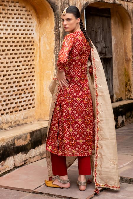 Shop_Karaj Jaipur_Red Chanderi, Cotton Tassels, Gota Patti, Mirrors, Patola Print Kurta Set _at_Aza_Fashions
