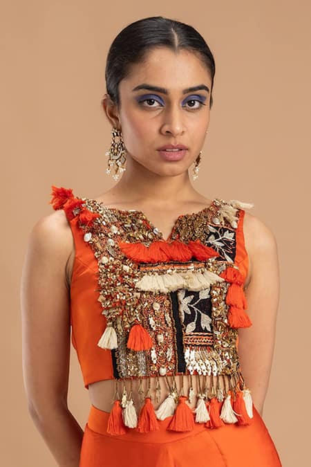 Shop Lavina Sippy Orange Modal Sequins, Beads, Tassels Tribal Hand Embroidered Blouse And Dhoti Pant at Aza Fashions Shop_Lavina Sippy_Orange Modal Sequins, Beads, Tassels Tribal Hand Embroidered Blouse And Dhoti Pant _at_Aza_Fashions