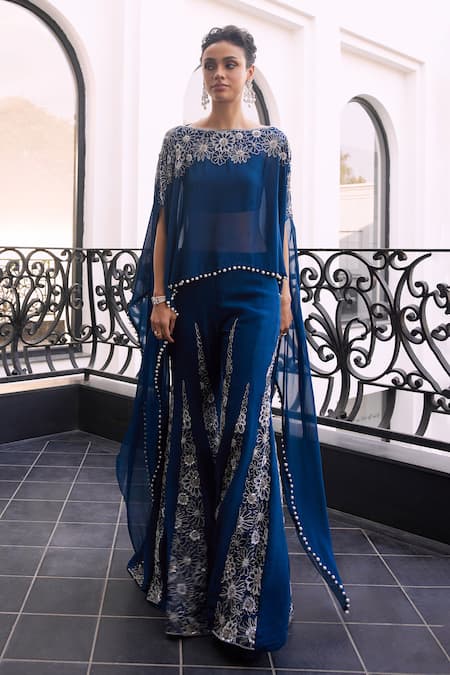 Shop Charu And Vasundhara Blue Organza, Taffeta Sequins Bloom Embroidered Cape Top And Sharara Set Online at Aza Fashions Shop_Charu And Vasundhara_Blue Organza, Taffeta Sequins Bloom Embroidered Cape Top And Sharara Set _Online_at_Aza_Fashions