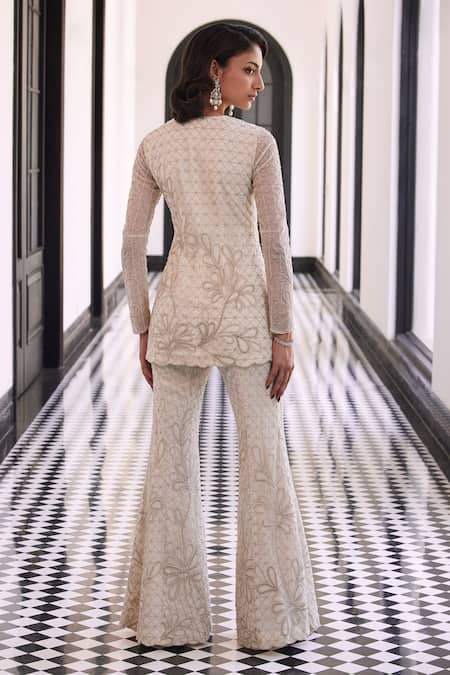 Shop Charu And Vasundhara Ivory Organza, Taffeta Cut Work, Sequins, Beads Peplum Embroidered Kurta Set at Aza Fashions Shop_Charu And Vasundhara_Ivory Organza, Taffeta Cut Work, Sequins, Beads Peplum Embroidered Kurta Set _at_Aza_Fashions