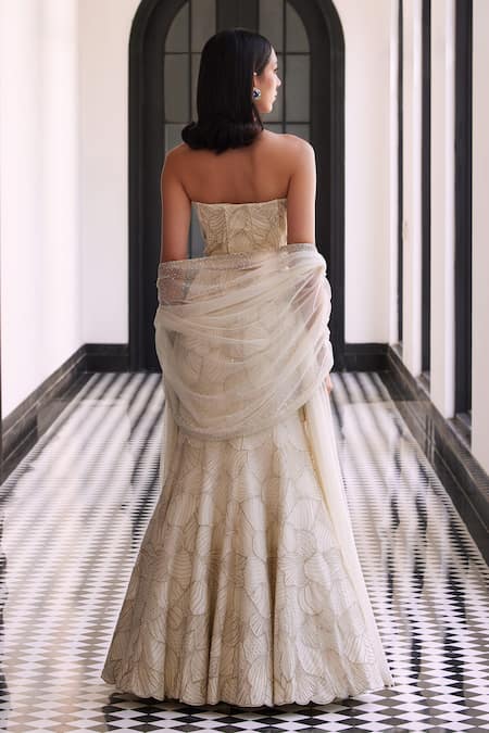 Charu And Vasundhara Ivory Embroidered Fishcut Lehenga Set 