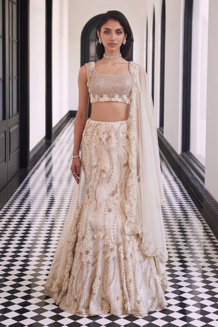 Shop Charu And Vasundhara Ivory Taffeta, Tussar, Net Sequins, Cut Cutdana Embroidered Fischcut Lehenga Set Online at Aza Fashions Shop_Charu And Vasundhara_Ivory Taffeta, Tussar, Net Sequins, Cut Cutdana Embroidered Fischcut Lehenga Set _Online_at_Aza_Fashions