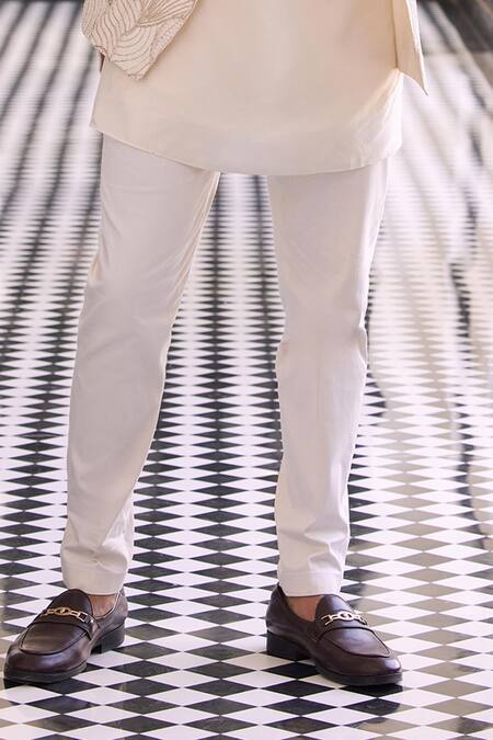 Buy_Charu And Vasundhara_Ivory Silk Cut Work, Pearls Embroidered Bandhgala Set _Online_at_Aza_Fashions