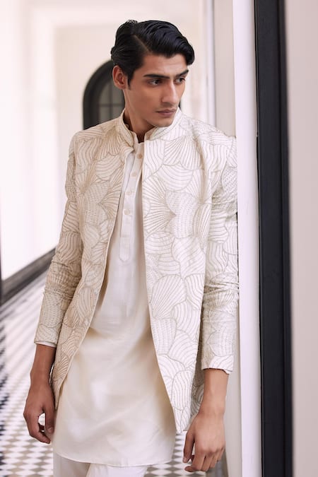 Shop_Charu And Vasundhara_Ivory Silk Cut Work, Pearls Embroidered Bandhgala Set _Online_at_Aza_Fashions