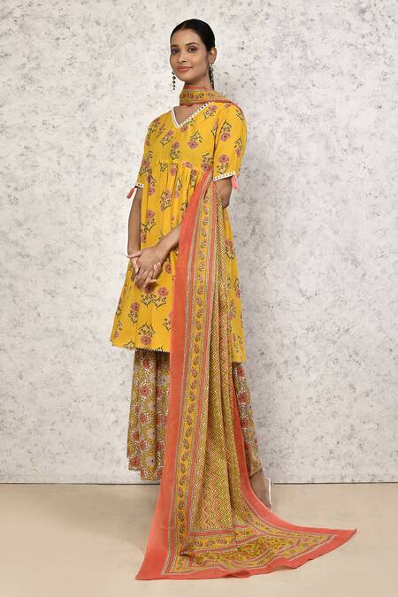 Naintara Bajaj_Yellow Cotton Embroidery, Lace Blossom Pattern Short Anarkali Flared Pant Set _at_Aza_Fashions