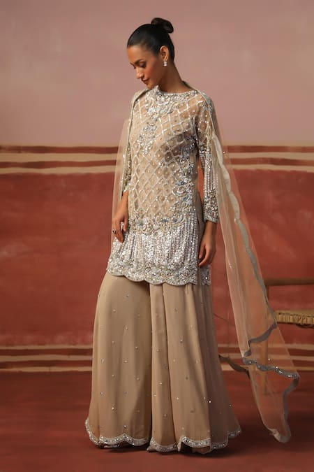 Shop Sabe Beige Net, Georgette Sequins, Beads Quatrefoil Embellished Kurta Sharara Set Online at Aza Fashions Shop_Sabe_Beige Net, Georgette Sequins, Beads Quatrefoil Embellished Kurta Sharara Set _Online_at_Aza_Fashions