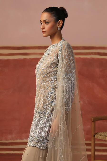 Sabe Beige Net, Georgette Sequins, Beads Quatrefoil Embellished Kurta Sharara Set at Aza Fashions Sabe_Beige Net, Georgette Sequins, Beads Quatrefoil Embellished Kurta Sharara Set _at_Aza_Fashions