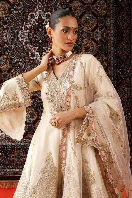 Sabe Ivory Net, Tissue Sequins, Zari, Embroidery V-neck Floral Kurta Sharara Set at Aza Fashions Sabe_Ivory Net, Tissue Sequins, Zari, Embroidery V-neck Floral Kurta Sharara Set _at_Aza_Fashions