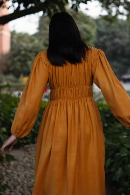RAAS LIFE_Yellow Wool Round Neck Mustard Smocked Midi Dress _Online_at_Aza_Fashions